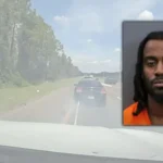 A sheriff's vehicle on a highway after deputies stopped a car with a grappler device