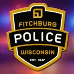 Fitchburg police vehicle parked near a dealership lot on East Badger Road