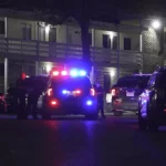 Police investigate an apartment complex shooting scene on San Antonio's Southeast Side