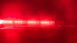 High Point police vehicles near an apartment complex after officers recovered three firearms