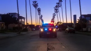 San Diego police vehicle parked near a college area street at night