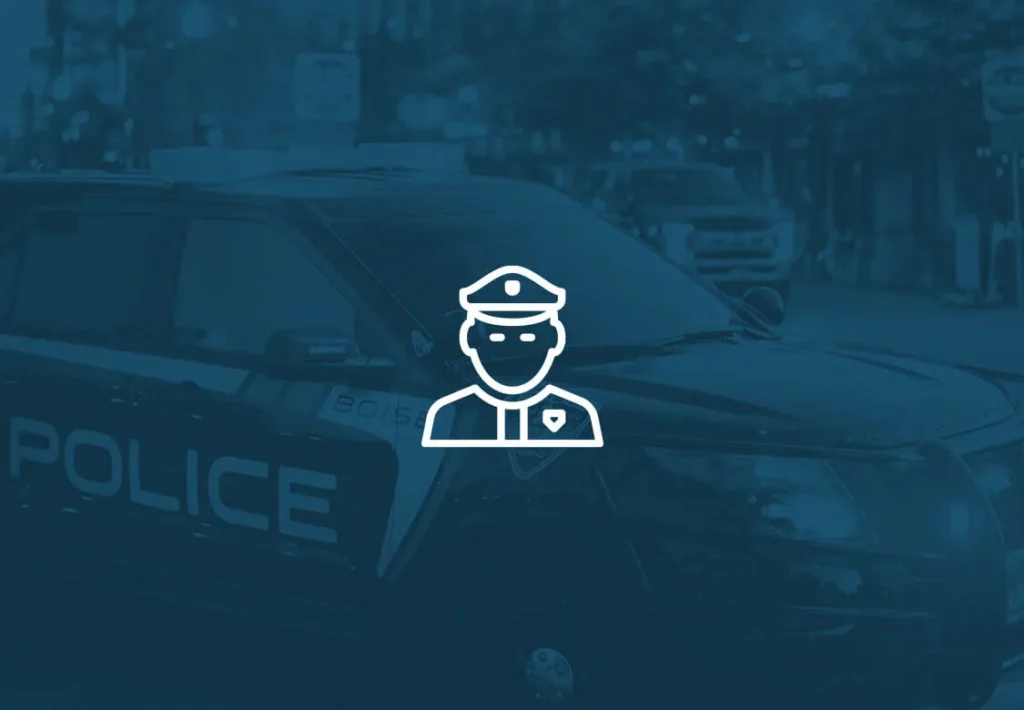 Boise police vehicle parked near a retail store during an organized retail crime investigation